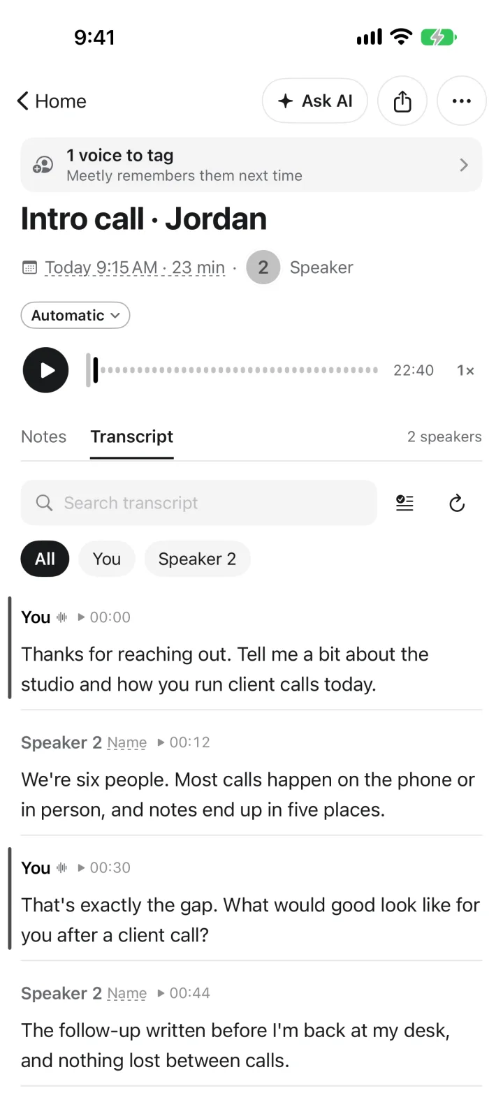 Meetly transcript of an intro call: each line labelled with its speaker and time, with the audio player above.
